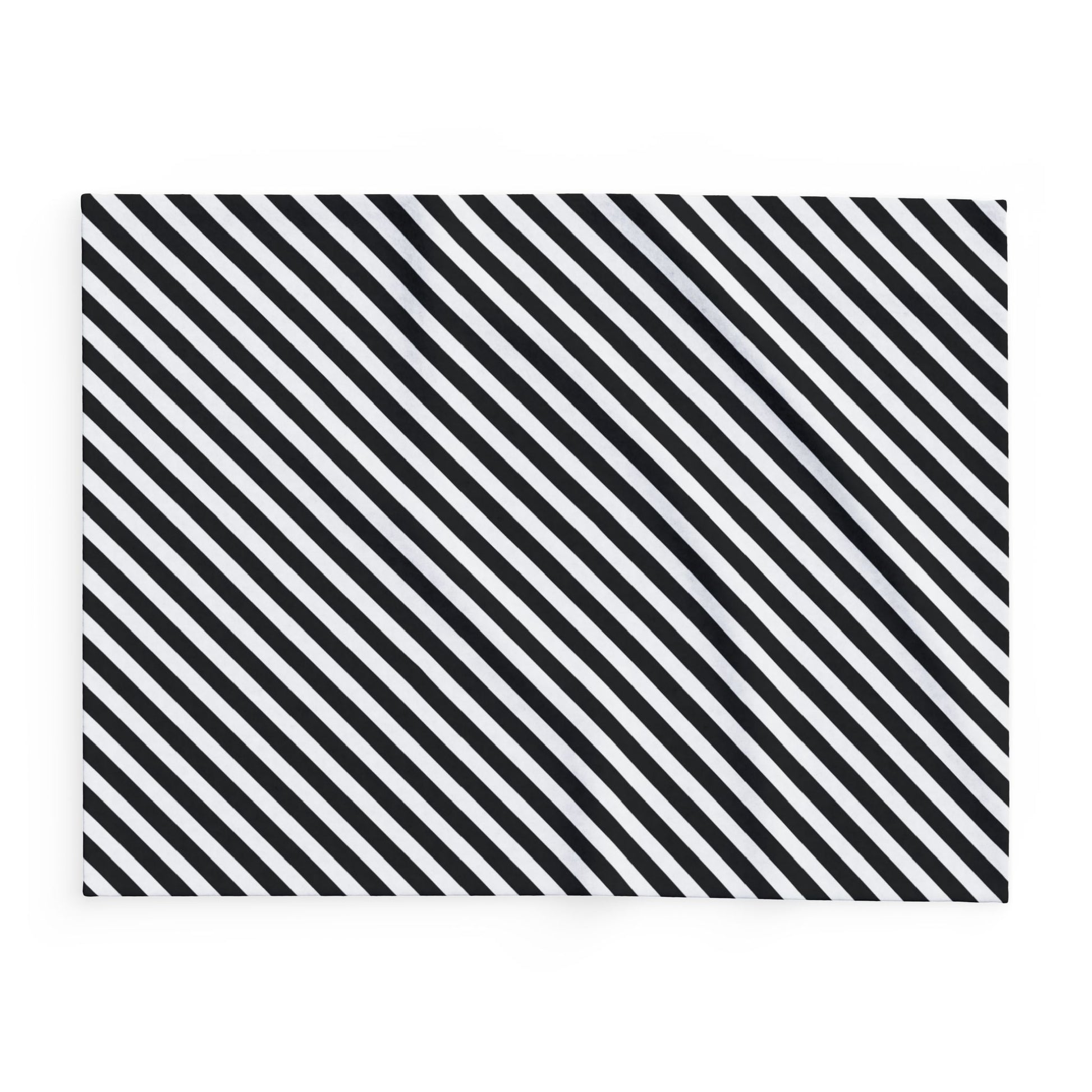 Black and white striped fleece blanket shown across all three sizes, 30x40 to 60x80