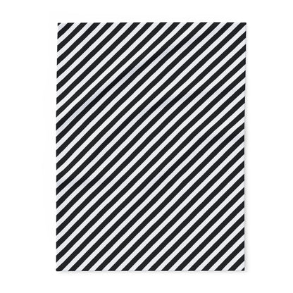 Black and white diagonal striped fleece blanket, folded flat — quick-drying 315gsm polyester throw for fire pits and porches