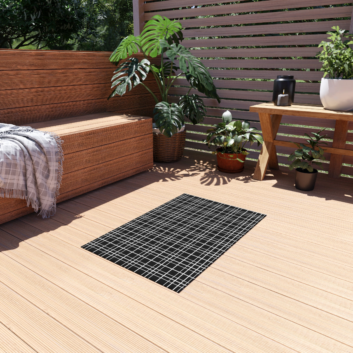 Black windowpane grid outdoor rug — soft polyester chenille with a non-slip backing