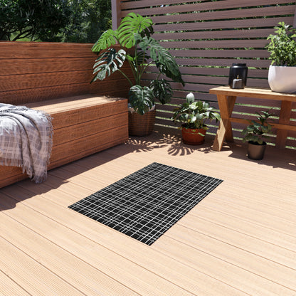 Black windowpane grid outdoor rug — soft polyester chenille with a non-slip backing