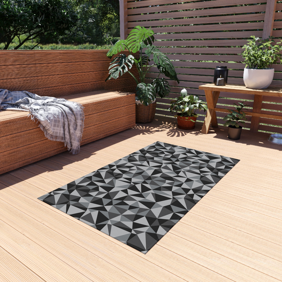 Charcoal facet outdoor rug — soft polyester chenille with a non-slip backing