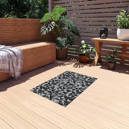 Charcoal facet outdoor rug — soft polyester chenille with a non-slip backing