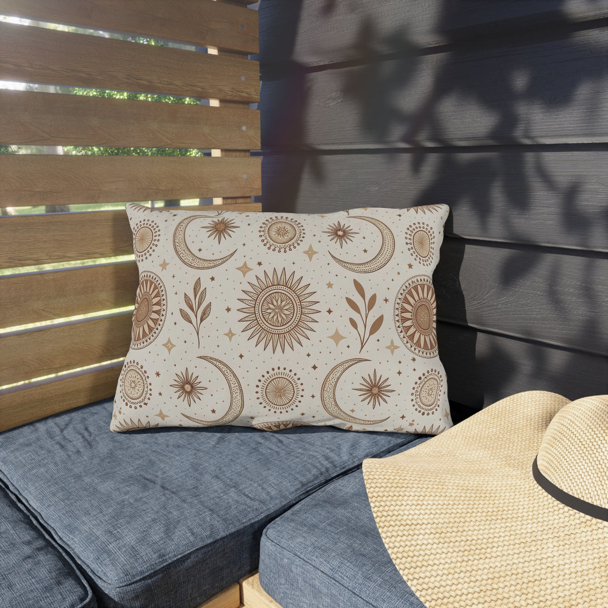 Golden sun and moon lumbar outdoor pillow — spun polyester, UV and water resistant