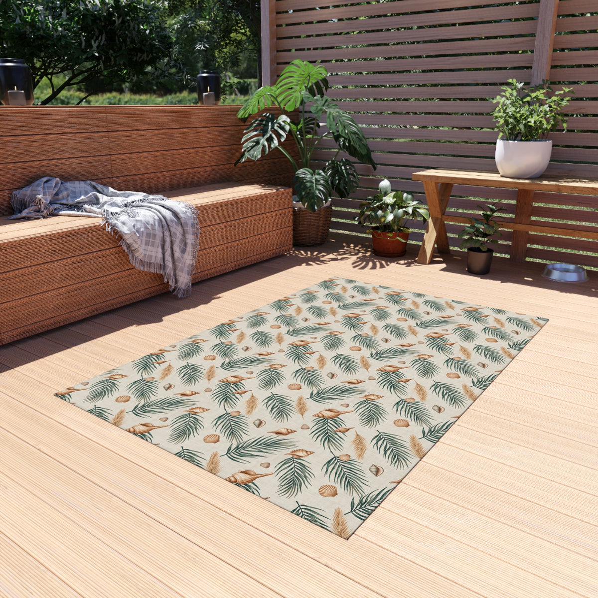Green palm and shell outdoor rug — soft polyester chenille with a non-slip backing
