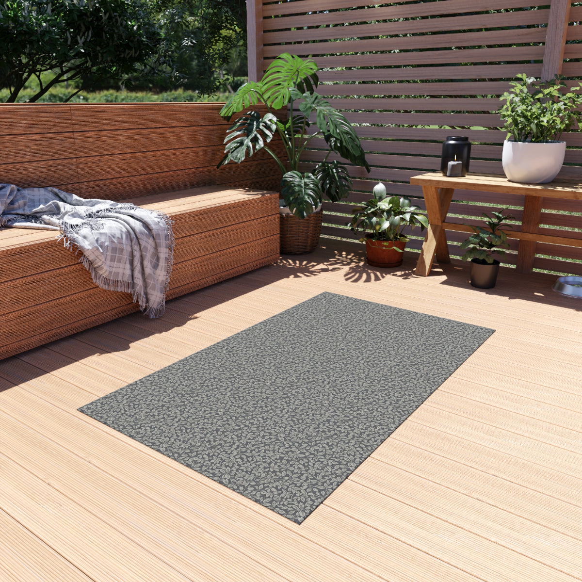 Grey foliage outdoor rug — soft polyester chenille with a non-slip backing