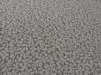 Close-up of the grey foliage outdoor rug — short, dense low-pile chenille nap