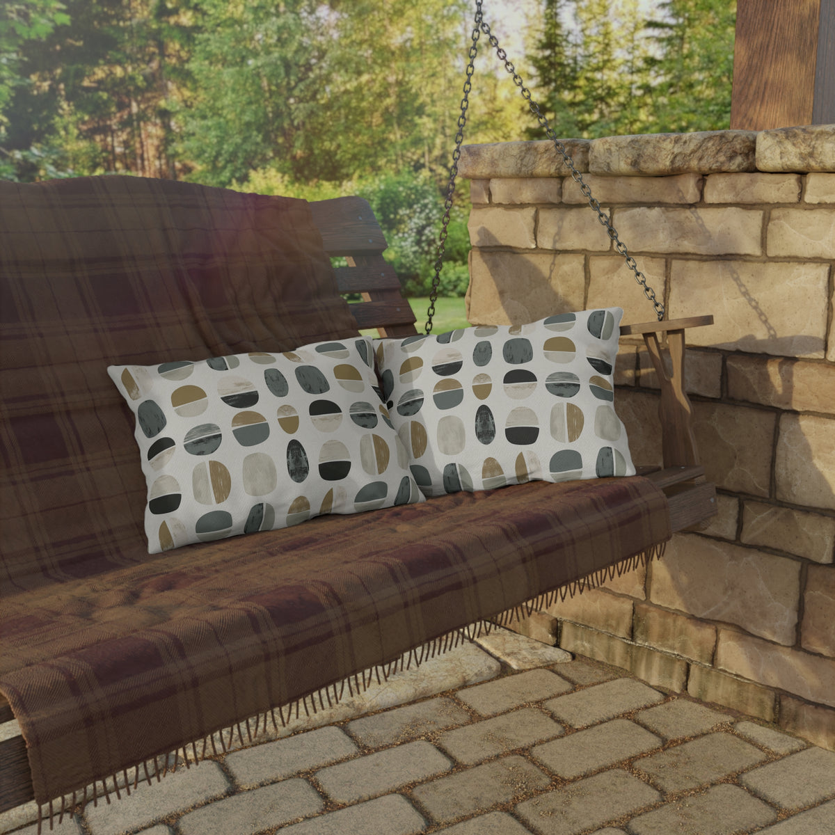 Grey split pebble lumbar outdoor pillow — spun polyester, UV and water resistant