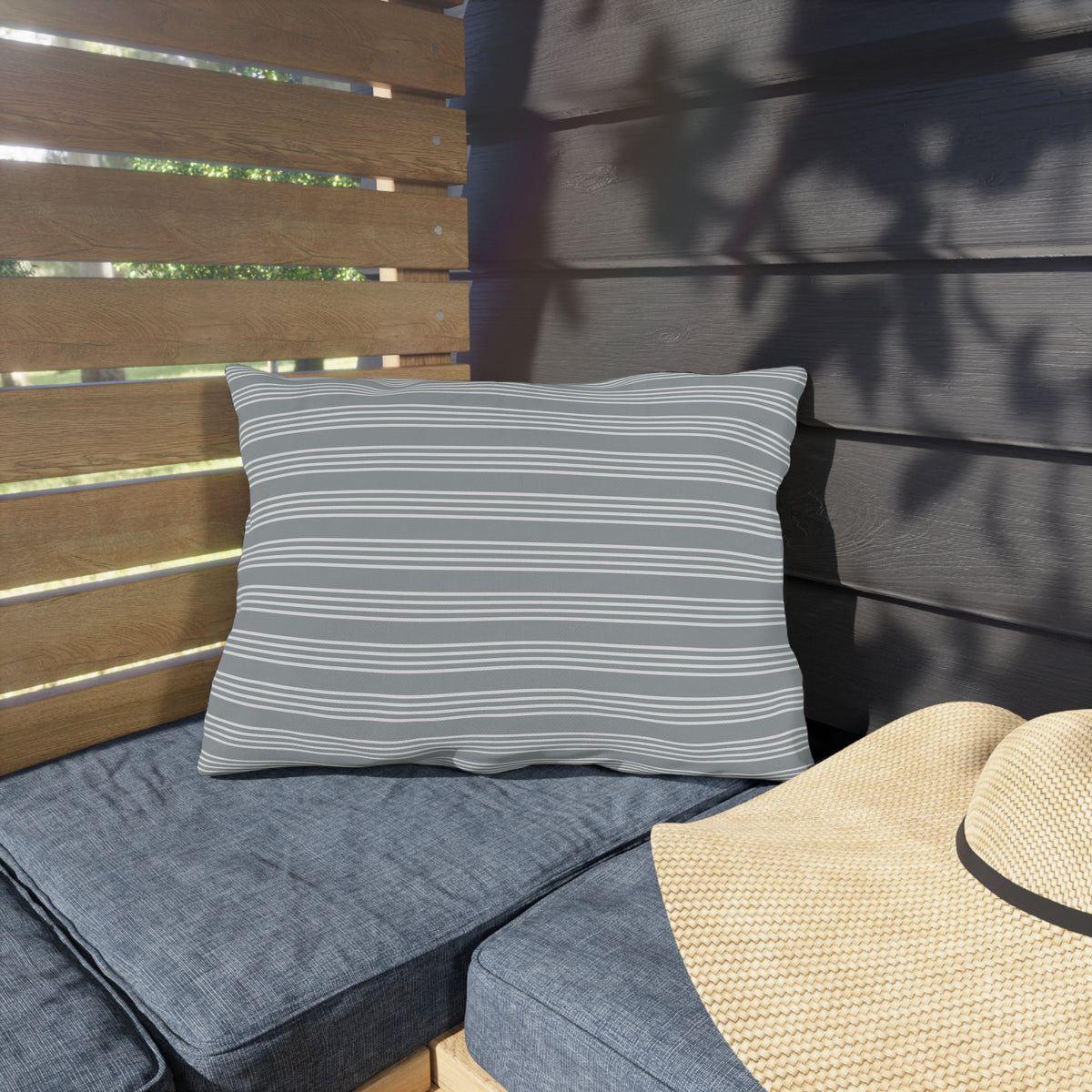 Grey ticking stripe lumbar outdoor pillow — spun polyester, UV and water resistant