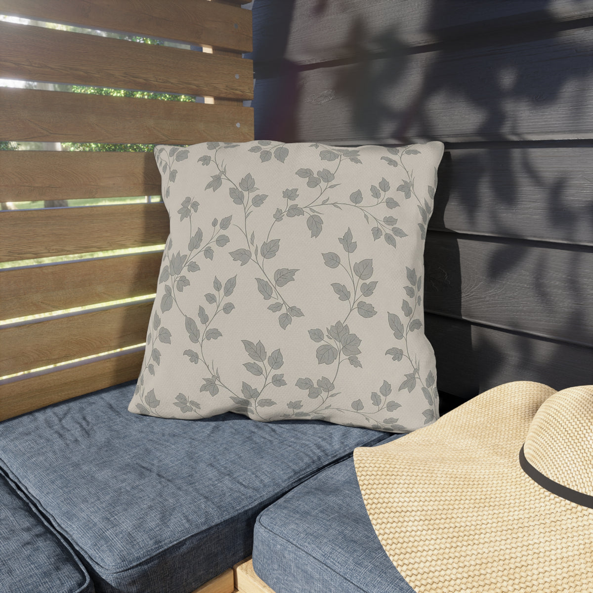Grey trailing vine outdoor pillow — spun polyester, UV and water resistant