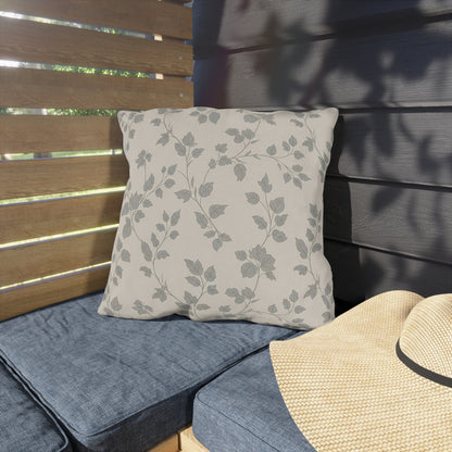 Grey trailing vine outdoor pillow — spun polyester, UV and water resistant