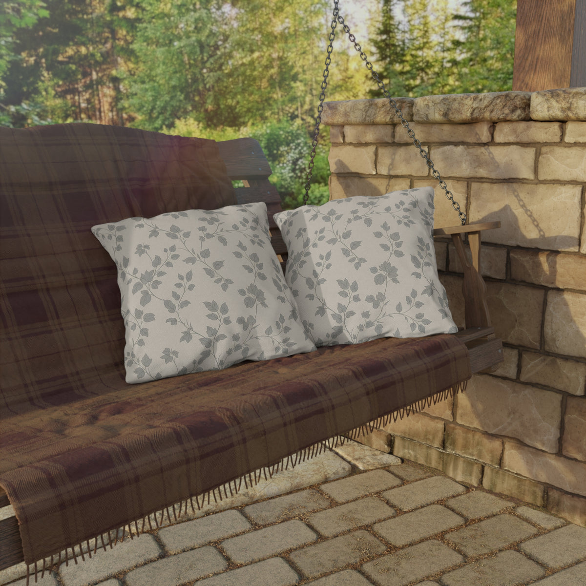 Grey trailing vine outdoor pillow — spun polyester, UV and water resistant