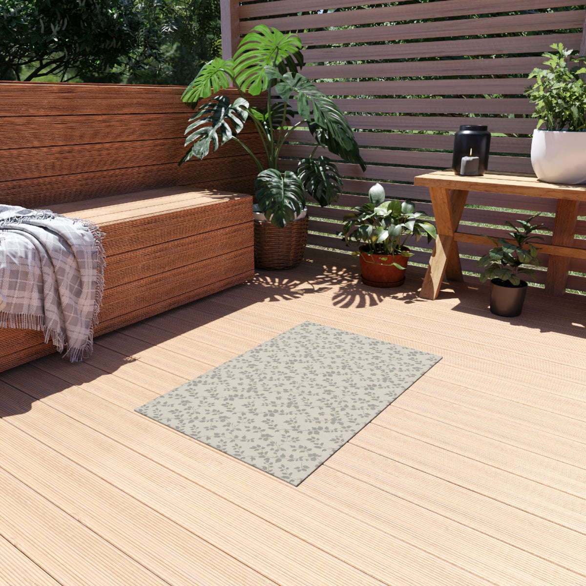 Grey trailing vine outdoor rug — soft polyester chenille with a non-slip backing