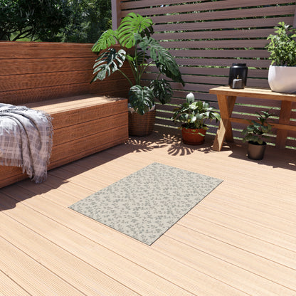 Grey trailing vine outdoor rug — soft polyester chenille with a non-slip backing