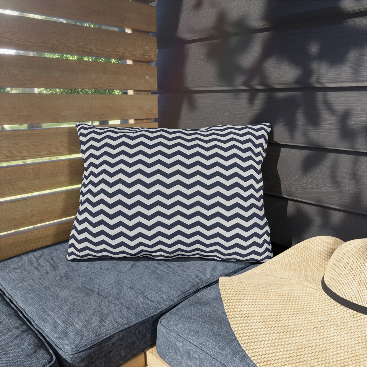 Navy and white chevron lumbar outdoor pillow — spun polyester, UV and water resistant