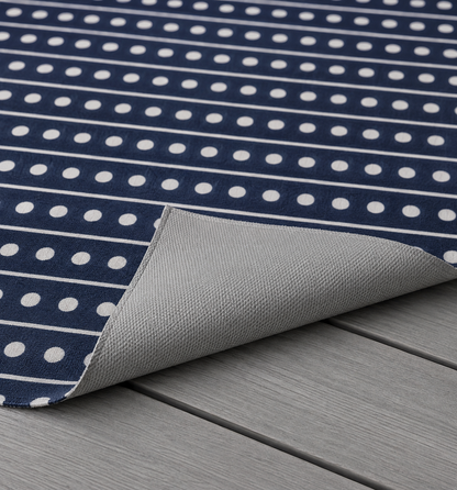 Navy and white dot stripe outdoor rug — soft polyester chenille with a non-slip backing
