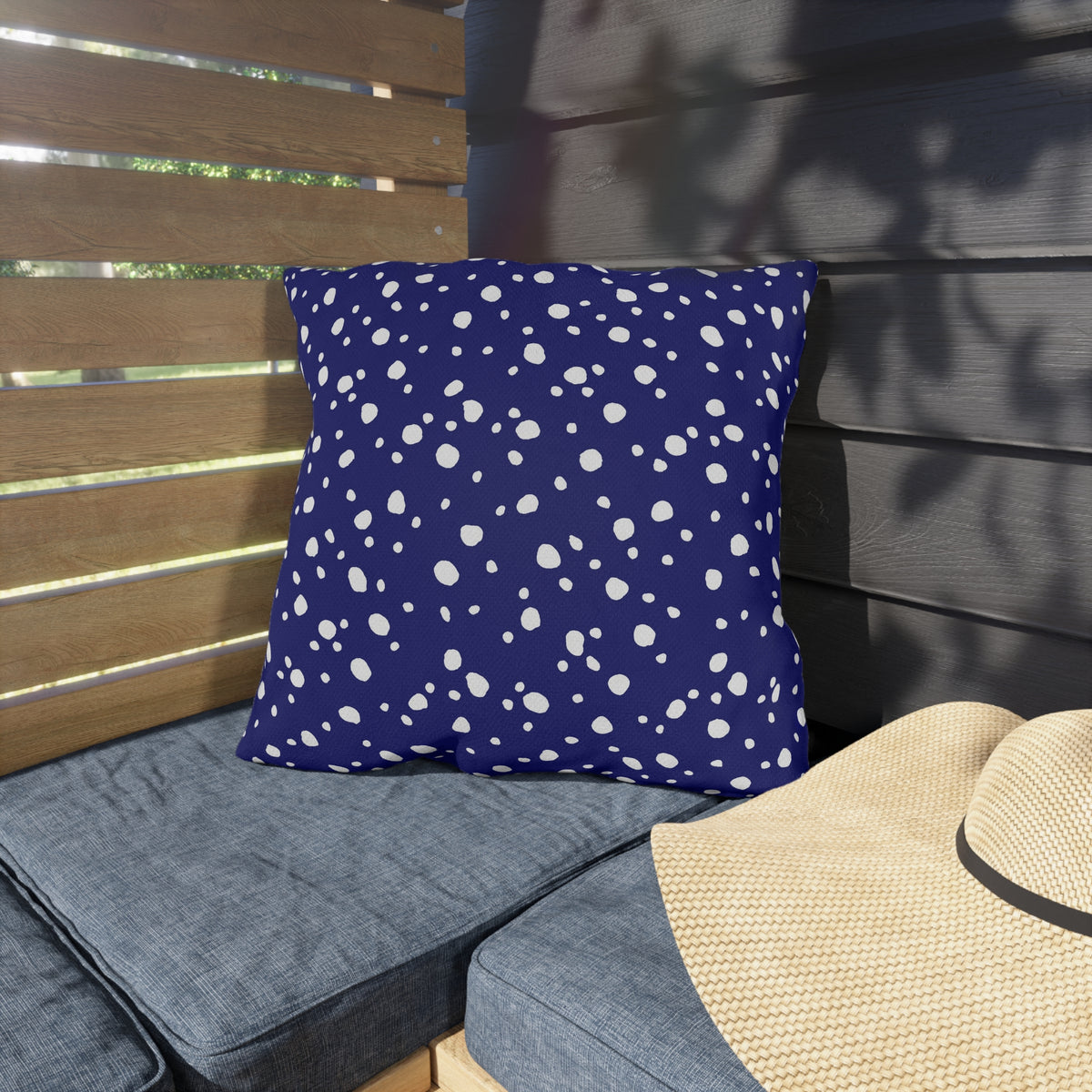 Navy and white painted dot outdoor pillow — spun polyester, UV and water resistant