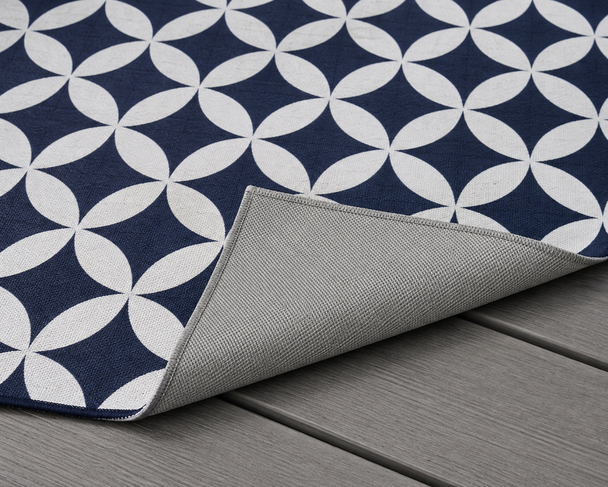 Navy and white trellis outdoor rug — soft polyester chenille with a non-slip backing