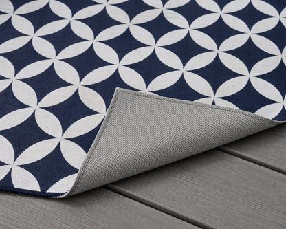 Navy and white trellis outdoor rug — soft polyester chenille with a non-slip backing
