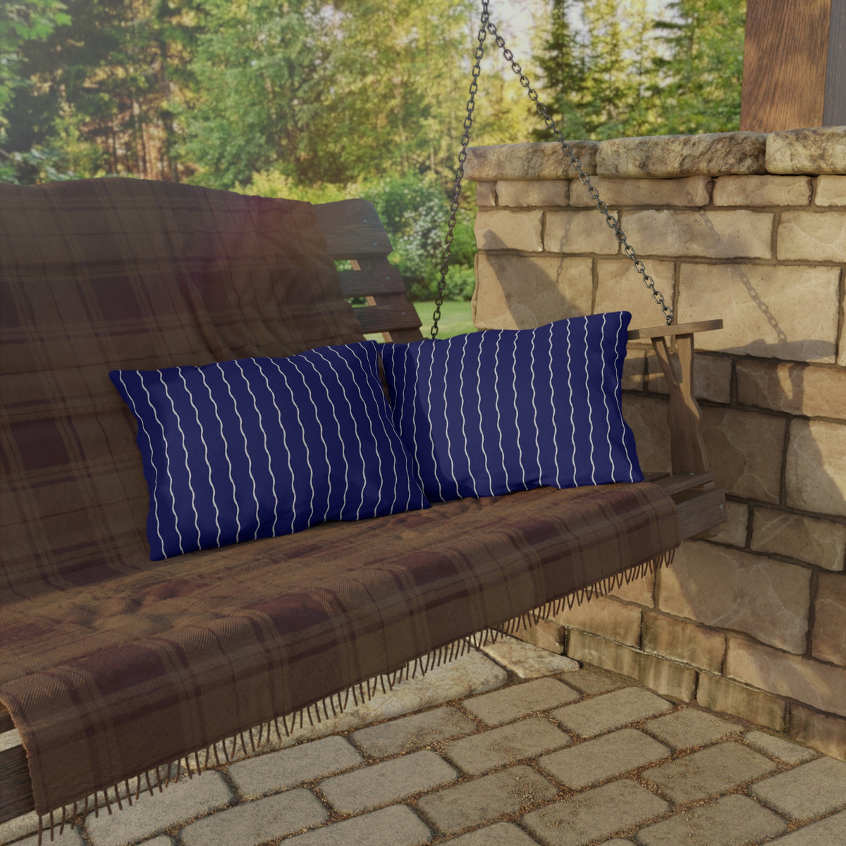 Navy and white wavy stripe lumbar outdoor pillow — spun polyester, UV and water resistant