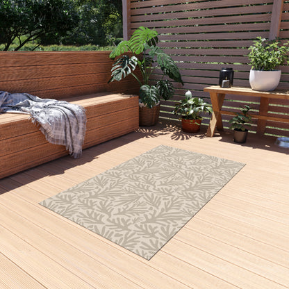 Neutral coral branch outdoor rug in taupe and cream — soft polyester chenille with a non-slip backing