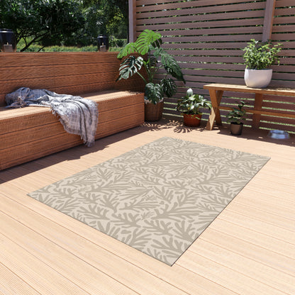 Neutral coral branch outdoor rug in taupe and cream — soft polyester chenille with a non-slip backing