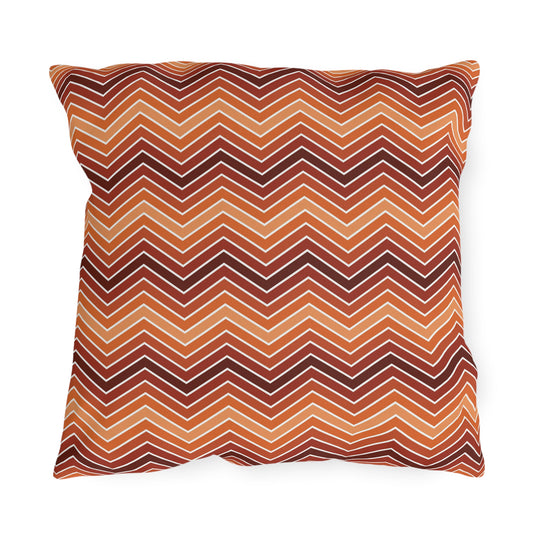 Rust chevron outdoor pillow — spun polyester, UV and water resistant