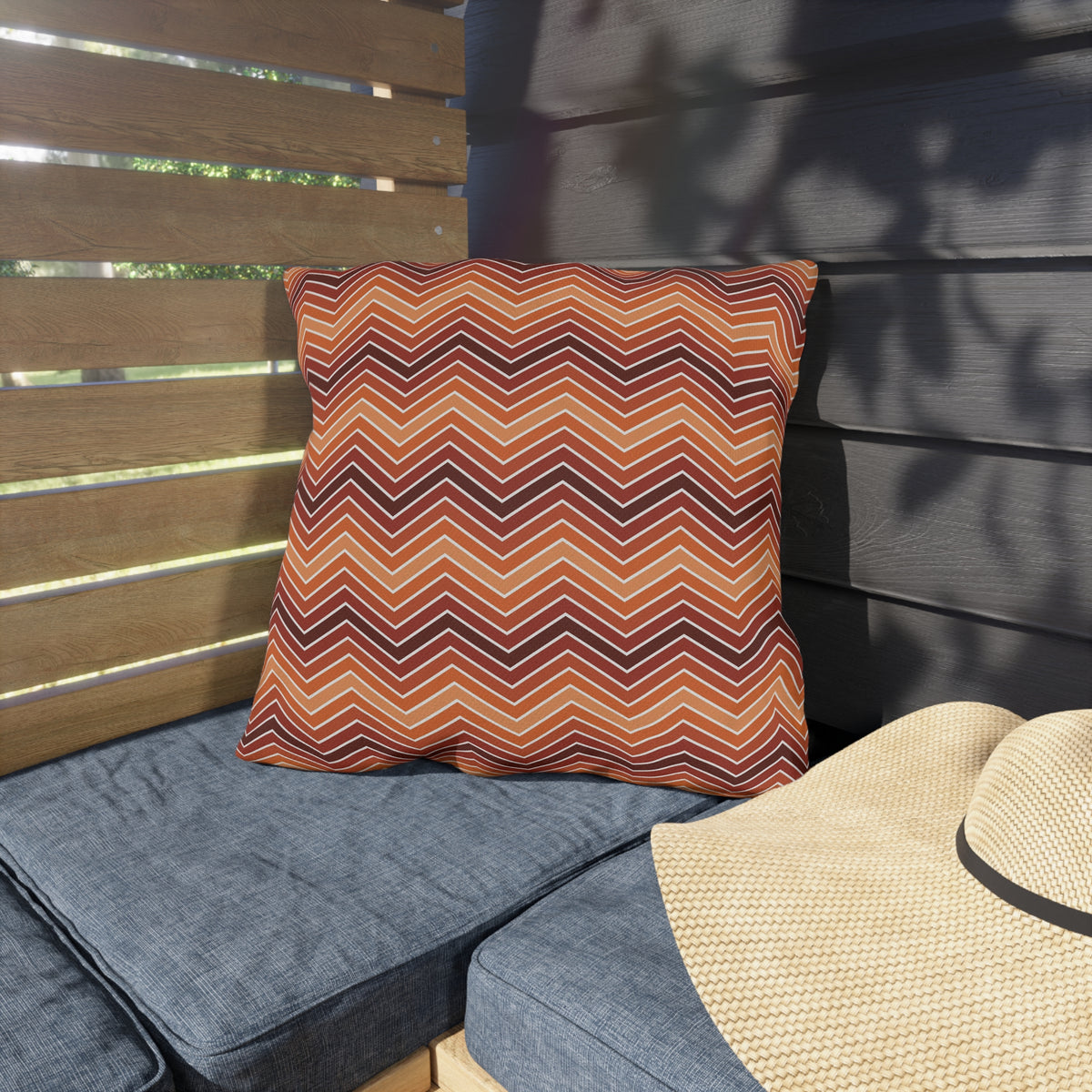 Rust chevron outdoor pillow — spun polyester, UV and water resistant