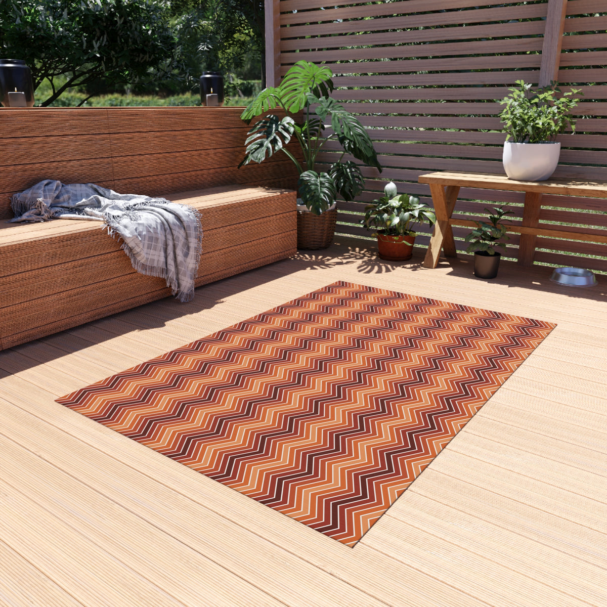 Rust chevron outdoor rug — soft polyester chenille with a non-slip backing