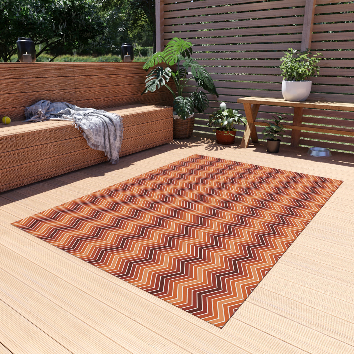Rust chevron outdoor rug — soft polyester chenille with a non-slip backing