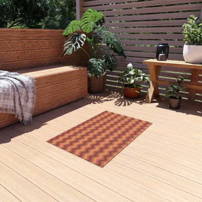 Rust chevron outdoor rug — soft polyester chenille with a non-slip backing