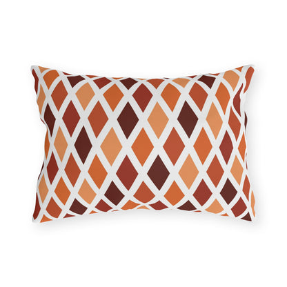 Rust harlequin diamond lumbar outdoor pillow — spun polyester, UV and water resistant