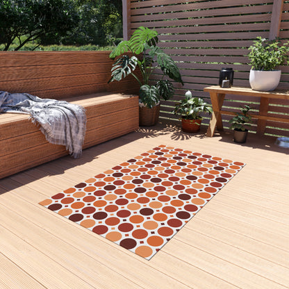 Terracotta dot grid outdoor rug — soft polyester chenille with a non-slip backing